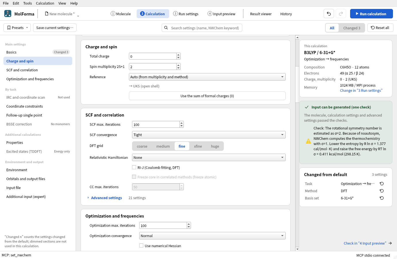 Spin multiplicity 2S+1 set to 2 in “Charge and spin”: “→ UKS (open shell)” appears under the reference, and the checks on the right say the input can be generated
