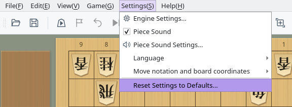 The Settings menu open with Reset Settings to Defaults… selected